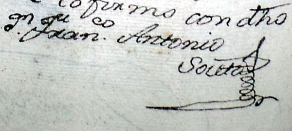 Firma del cura en una partida de bautismo