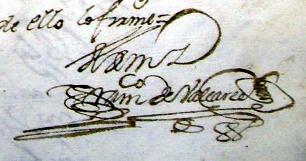 Firma del escribano en un documento antiguo